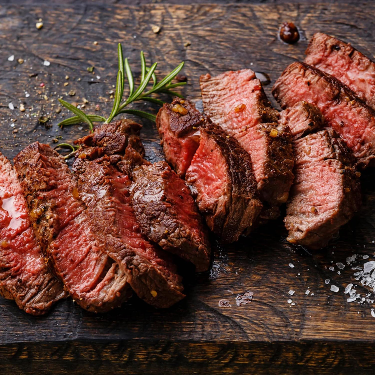Bear Mountain — Sliced steak on a cutting board